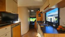 2006 Isuzu NQR House-Truck Motorhome — Self-Contained, Big Living Space